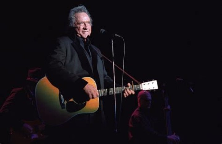 Why Johnny Cash's Signature Black Attire Was More Than A Fashion Choice